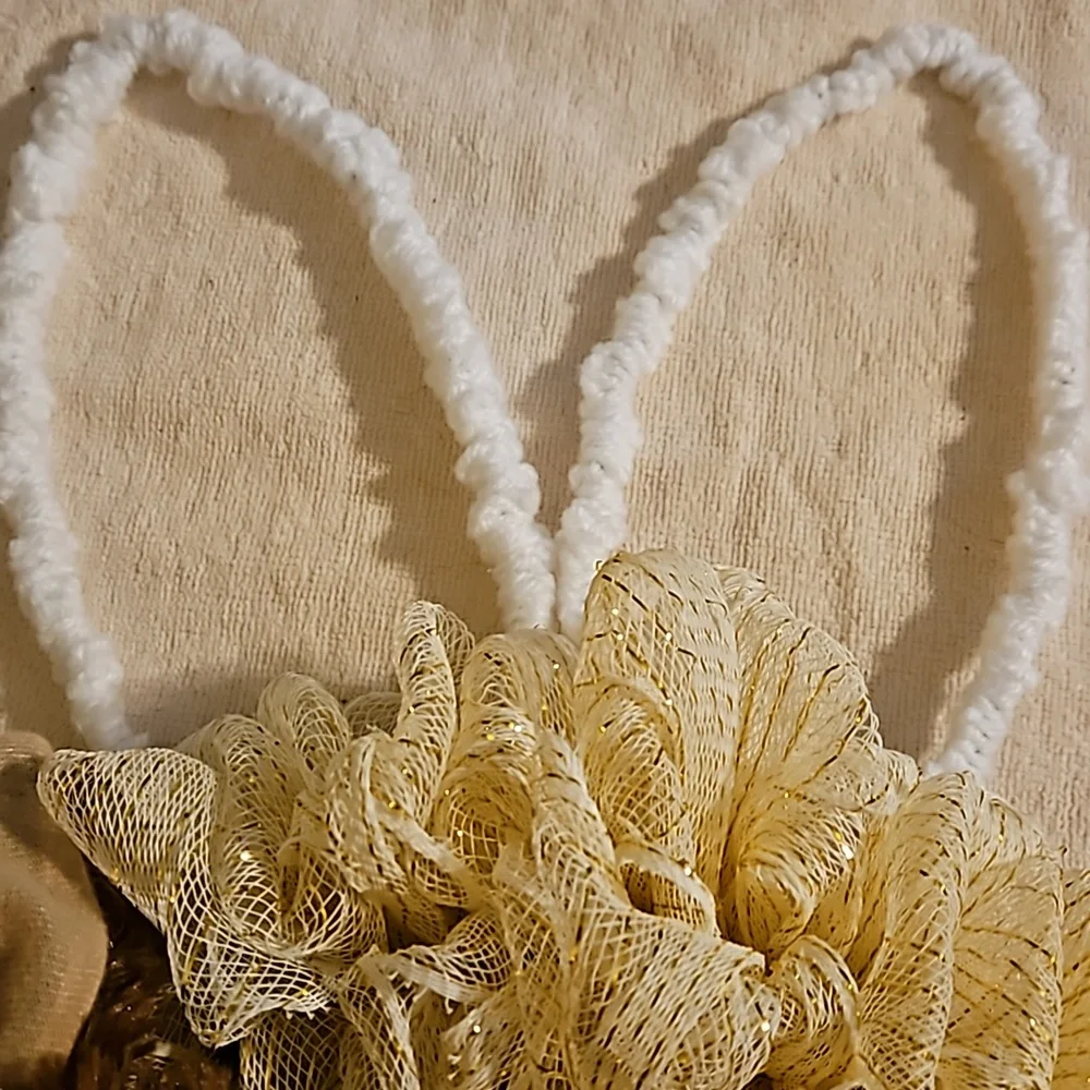 From mom's closet bunny wreath on a 9 inch bunny wreath that she made